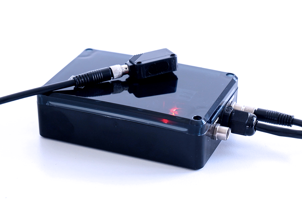 IoTabe IoT Terminal connected to an industrial sensor for collecting machine and process data